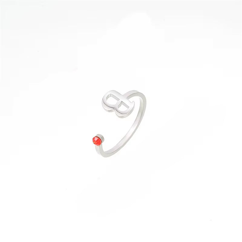 Ring met gepersonaliseerde initialen en geboortesteen